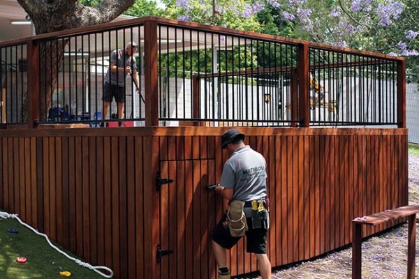 A property maintenance team working on the exterior area